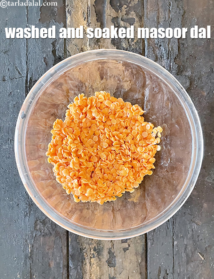 Step 14 – Place in a glass bowl and keep aside. The <strong>washed and drained masoor&nbsp;dal</strong> is ready.