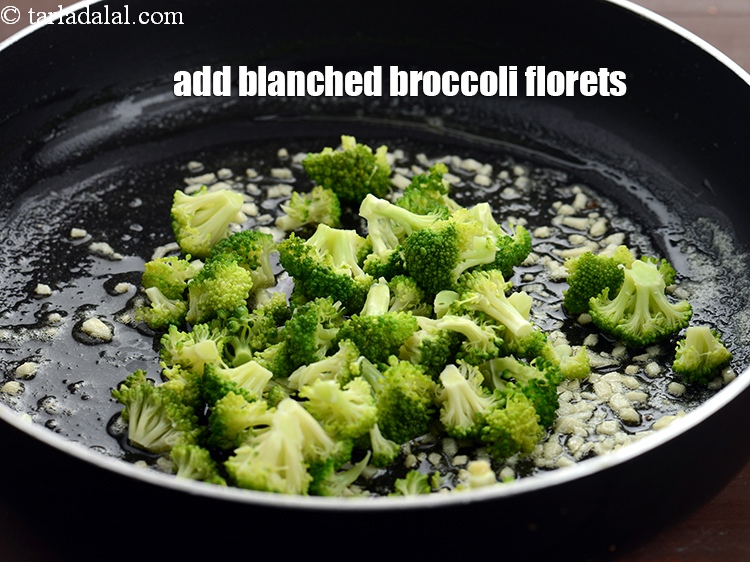 Step 9 – Add 1 cup <a href="https://www.tarladalal.com/glossary-blanched-broccoli-florets-719i">blanched broccoli florets</a>.