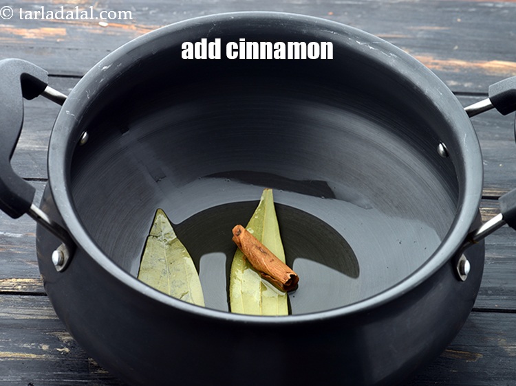 Step 10 – Add 25 mm. (1&quot;)&nbsp;<a href="https://www.tarladalal.com/glossary-cinnamon-dalchini-346i">cinnamon (dalchini)</a>