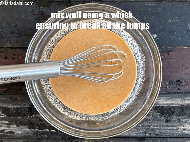 Step 11 – Mix well using a whisk ensuring to break all the lumps.
