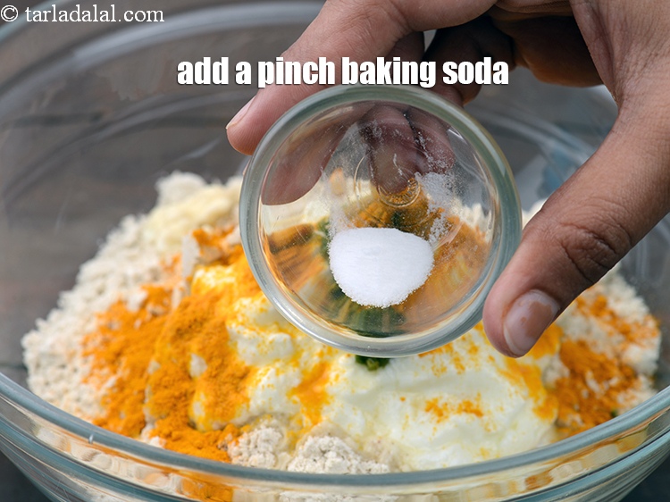 Step 9 – Add a pinch <a href="https://www.tarladalal.com/glossary-baking-soda-soda-bi-carb-615i">baking soda</a>.
