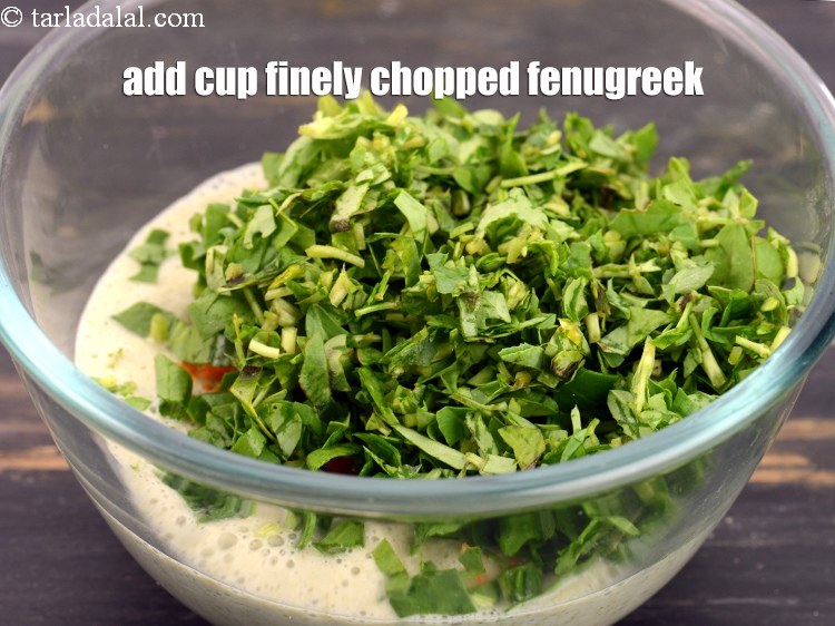 Step 9 – Add &frac14; cup finely <a href="https://www.tarladalal.com/glossary-chopped-fenugreek-811i">chopped fenugreek (methi)</a>.&nbsp;