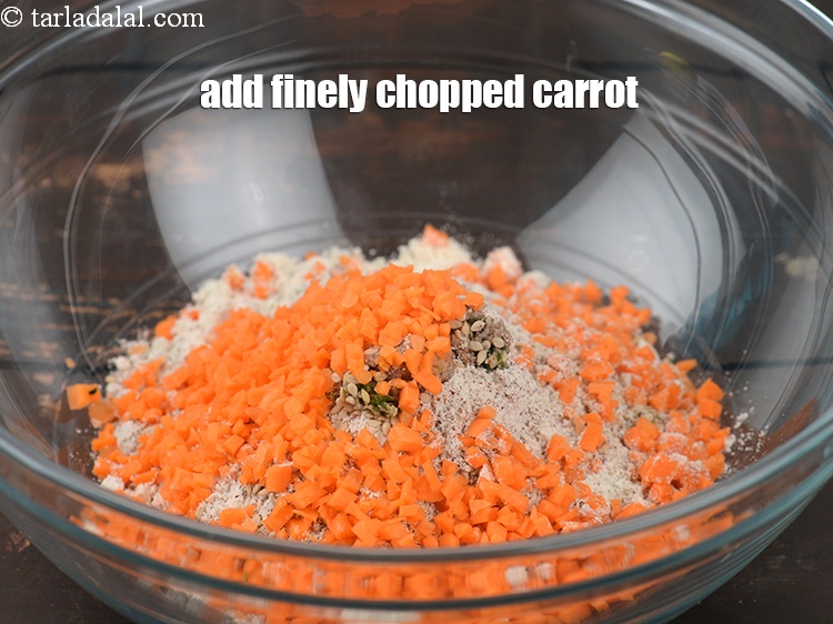 Step 9 – Add 1/4 cup&nbsp;finely&nbsp;<a href="https://www.tarladalal.com/glossary-chopped-carrot-798i">chopped carrot</a>.&nbsp;