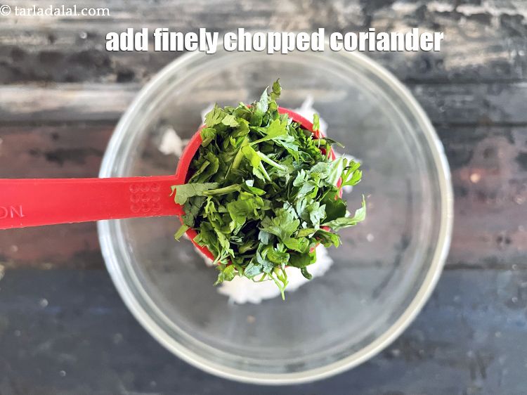 Step 31 – Add 2&nbsp;tbsp&nbsp;finely&nbsp;<a href="glossary-chopped-coriander-783i">chopped coriander (dhania)</a>.
