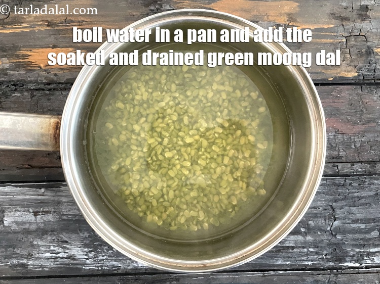 Step 9 – Bring water to boil in a pan.&nbsp;Add the soaked and drained green moong dal.