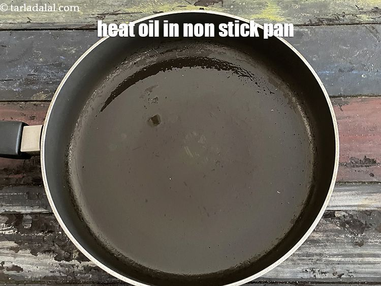 Step 12 – Heat 1 tbls oil in a broad non-stick pan.