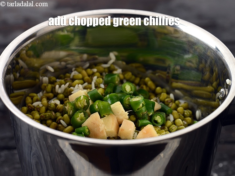 Step 9 – Add 1 tbsp <a href="https://www.tarladalal.com/glossary-chopped-green-chilli-820i">chopped green chillies</a>.