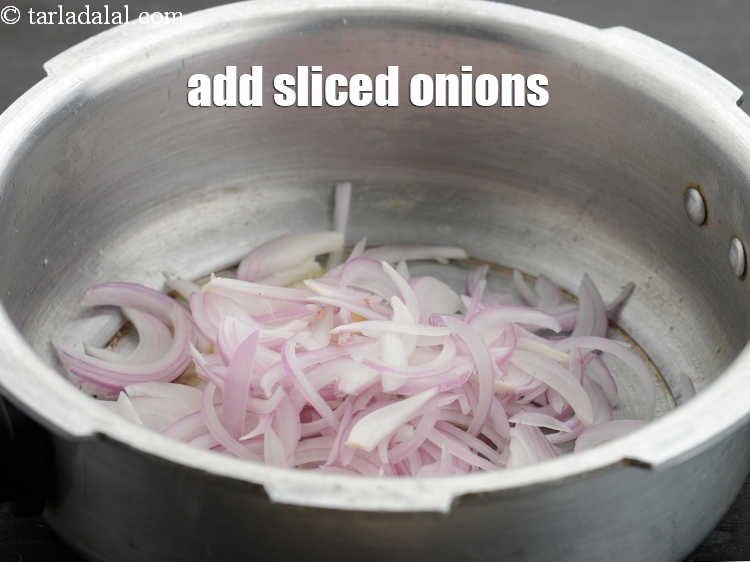 Step 12 – Add 3/4 cup&nbsp;<a href="https://www.tarladalal.com/glossary-sliced-onions-745i">sliced onions</a>.
