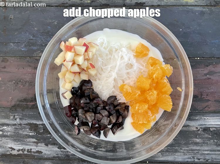 Step 14 – Add&nbsp;1/4 cup&nbsp;<a href="https://tarladalal.com/glossary-chopped-apple-56i">chopped apples</a>.