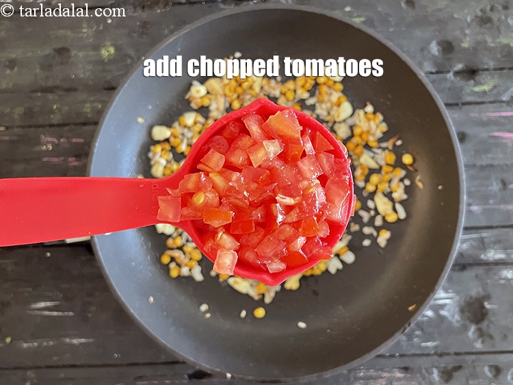Step 38 – Add&nbsp;1/4 cup chopped tomatoes.