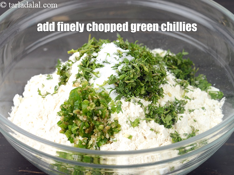 Step 9 – Add 2 tsp finely <a href="https://www.tarladalal.com/glossary-chopped-green-chilli-820i">chopped green chillies</a>.