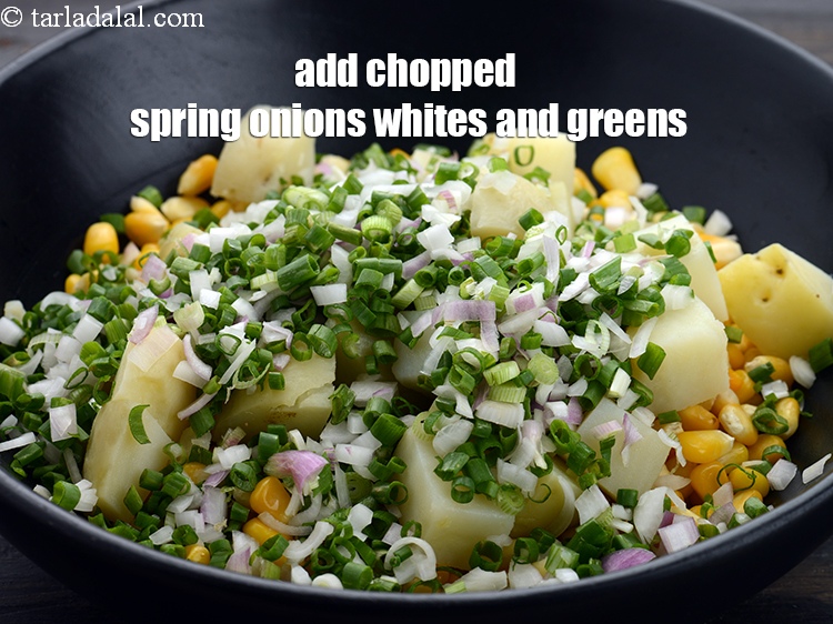 Step 9 – Add 1 cup&nbsp;<a href="https://www.tarladalal.com/glossary-chopped-spring-onion-whites-815i">chopped spring onions whites</a>&nbsp;and greens.&nbsp;