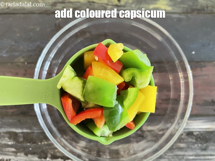 Step 20 – Add&nbsp;1/2 cup&nbsp;coloured&nbsp;<a href="glossary-capsicum-cubes-170i">capsicum cubes</a>.
