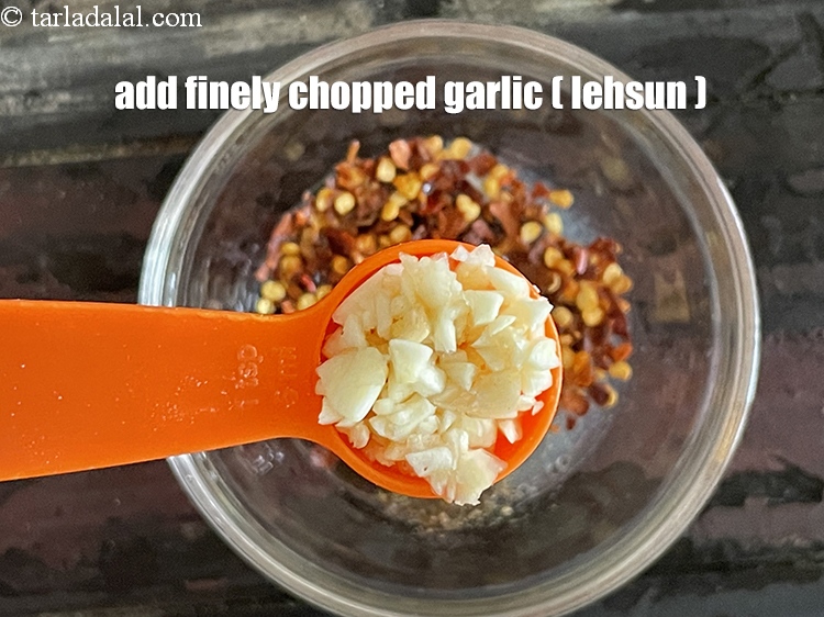 Step 21 – Add&nbsp;<meta charset="UTF-8" />2 tsp&nbsp;finely&nbsp;<a href="glossary-chopped-garlic-790i">chopped garlic (lehsun)</a>.