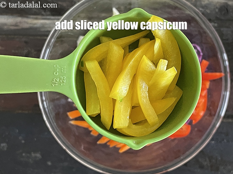 Step 10 – Add&nbsp;<meta charset="UTF-8" />1/4 cup&nbsp;thinly&nbsp;<a href="glossary-sliced-yellow-capsicum-2178i">sliced yellow capsicum</a>.
