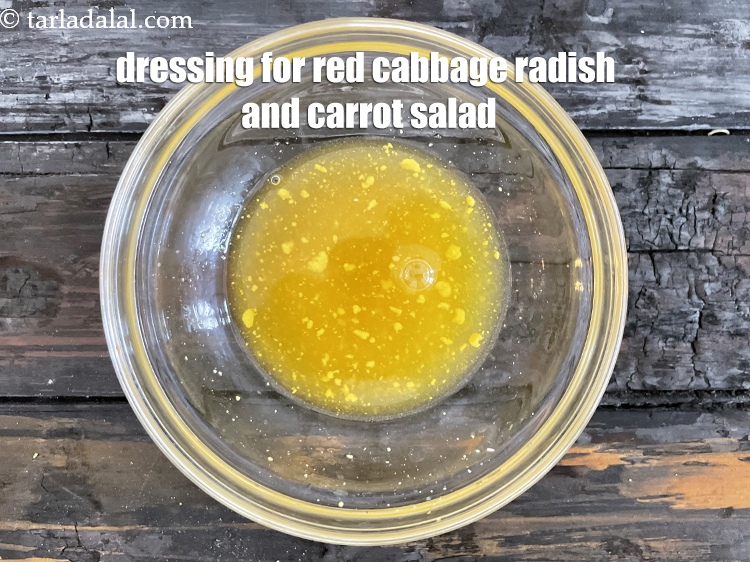 Step 11 – Keep aside&nbsp;dressing of red cabbage radish and carrot salad.