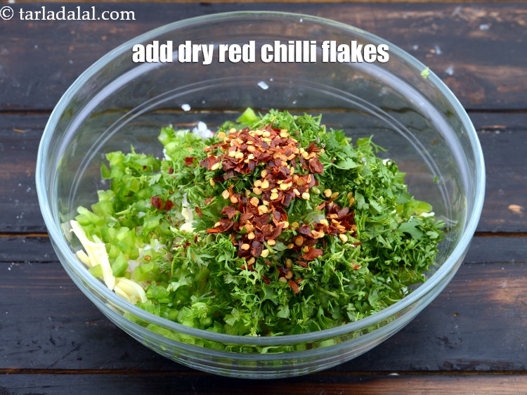 Step 9 – Add 2 tsp&nbsp;<a href="https://www.tarladalal.com/glossary-dry-red-chilli-flakes-paprika-338i">dry red chilli flakes (paprika)</a>.
