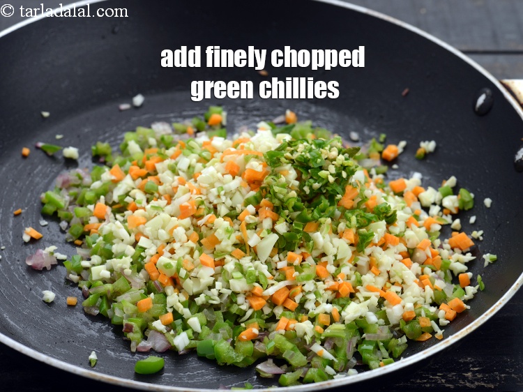 Step 9 – Add 1 tsp&nbsp;finely&nbsp;<a href="https://www.tarladalal.com/glossary-chopped-green-chilli-820i">chopped green chillies</a>.