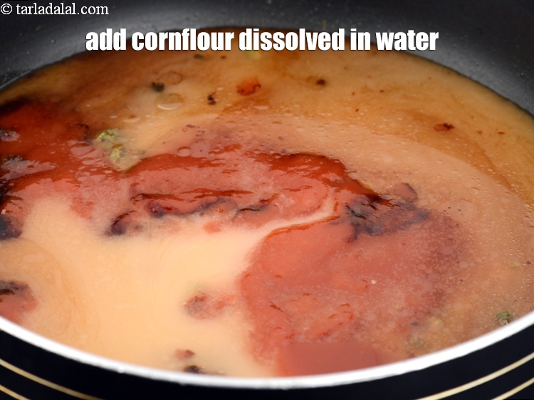 Step 10 – Add 1 tsp <a href="https://www.tarladalal.com/glossary-cornflour-cornstarch-maize-starch-corn-flour-112i">cornflour</a> dissolved in 1/2 cup of water.