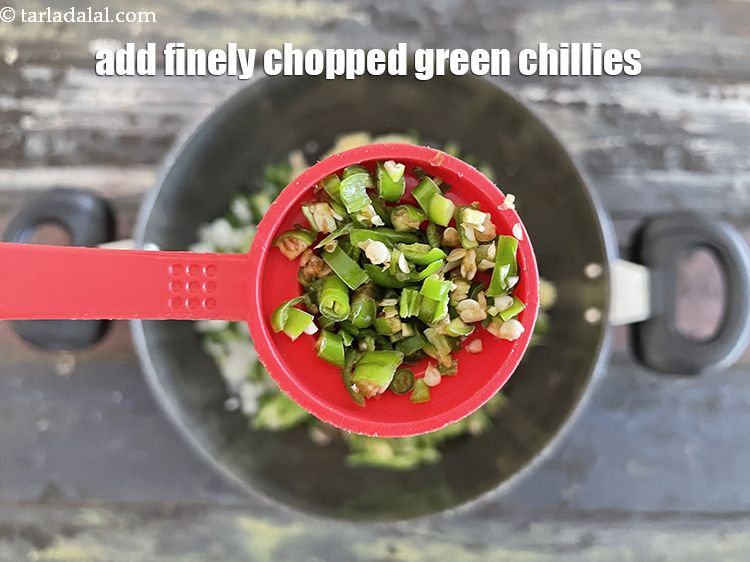 Step 12 – Add&nbsp;1 tsp&nbsp;finely&nbsp;<a href="glossary-chopped-green-chilli-820i">chopped green chillies</a>.