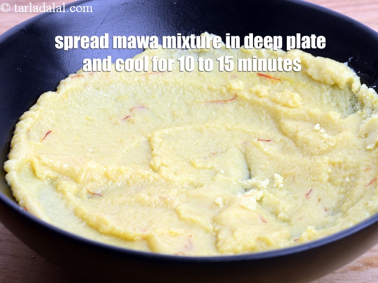 Step 9 – Spread the mawa mixture in deep plate and keep aside to cool for 10 to …
