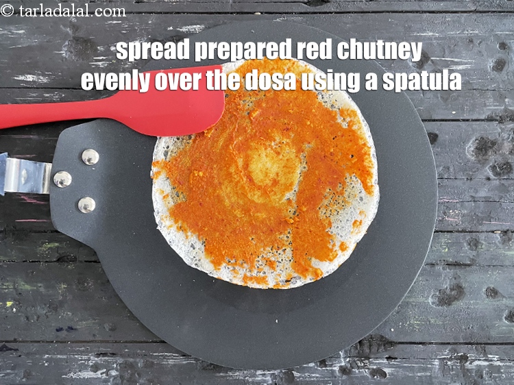 Step 71 – Spread 2 tsp of the prepared red chutney and spread it evenly over it.