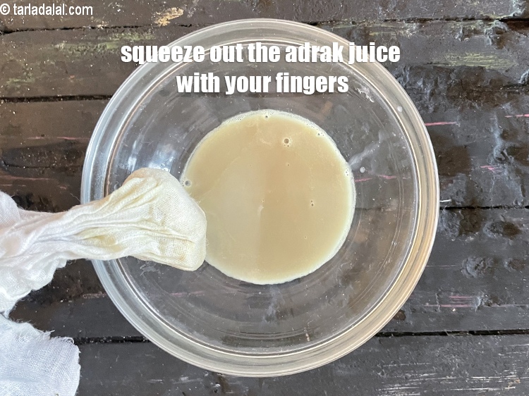 Step 11 – Squeeze with your fingers to get the adrak juice.