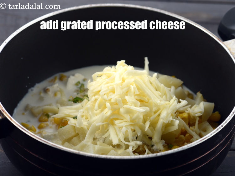 Step 9 – Add 1/3 cup <a href="https://www.tarladalal.com/glossary-grated-processed-cheese-868i">grated processed cheese</a>. You can use mozzarella cheese also.