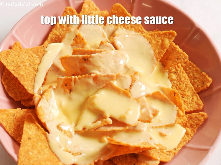 Step 25 – Top it with little cheese sauce.