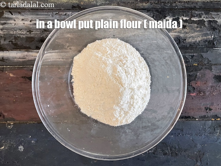 Step 13 – In a bowl put&nbsp;<meta charset="UTF-8" />1 1/2 cups&nbsp;<a href="glossary-plain-flour-maida-188i">plain flour (maida)</a>.