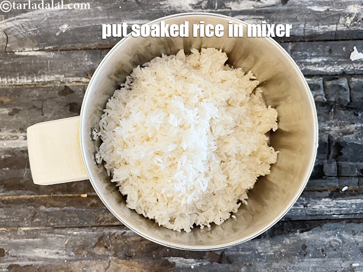 Step 15 – In a mixer, put the soaked rice.