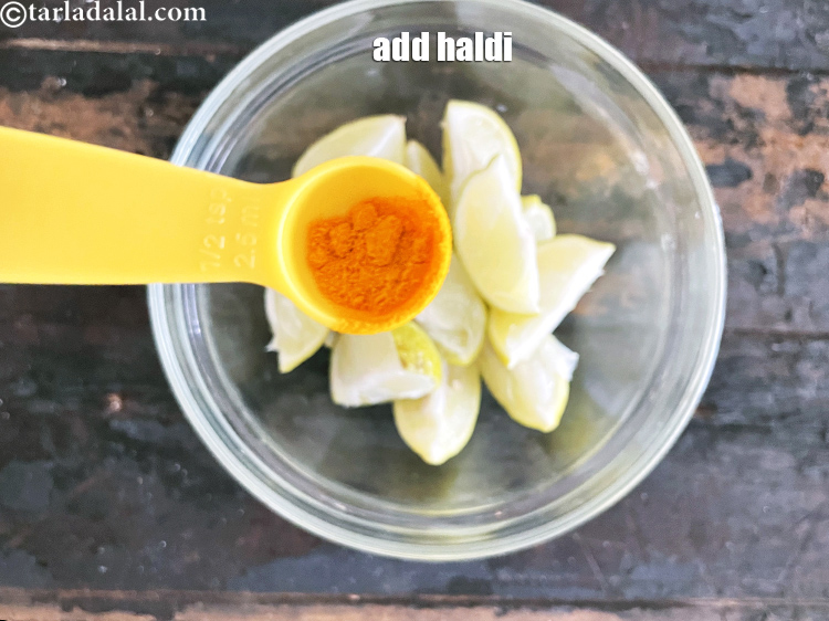 Step 10 – Add&nbsp;<meta charset="UTF-8" />a pinch&nbsp;<a href="glossary-turmeric-powder-haldi-645i">turmeric powder (haldi)</a>.
