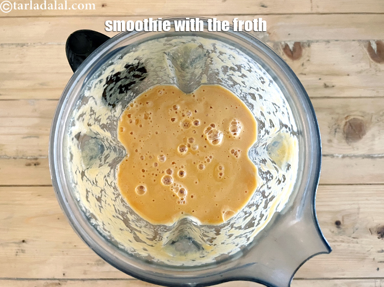 Step 13 – Top view of the <strong>papaya green apple smoothie</strong>&nbsp;showing the froth.