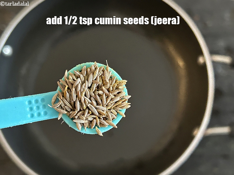 Step 11 – Add&nbsp;<meta charset="UTF-8" />1/2 tsp&nbsp;<a href="glossary-cumin-seeds-jeera-zeera-381i">cumin seeds (jeera)</a>.