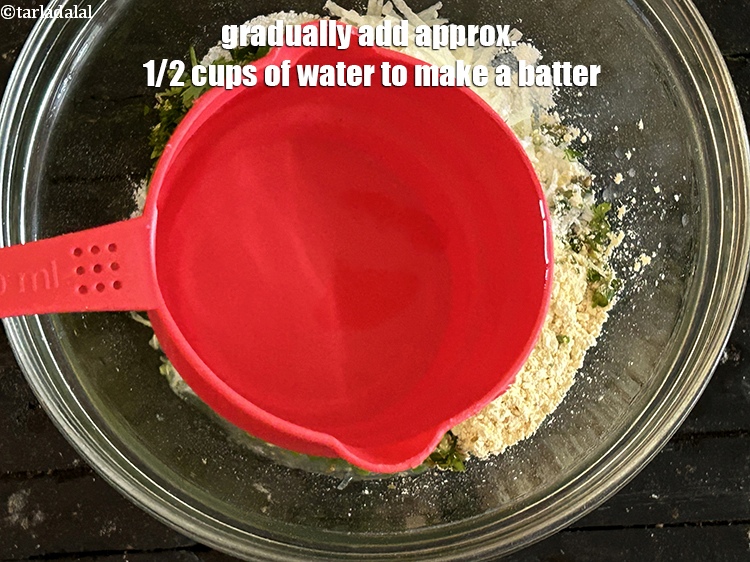 Step 10 – Gradually add&nbsp;<meta charset="UTF-8" />approx. 1/2&nbsp;cups of water to make a batter.