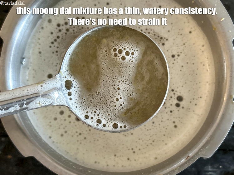 Step 12 – This moong dal mixture has a thin, watery consistency. There&#39;s no need to strain it. …