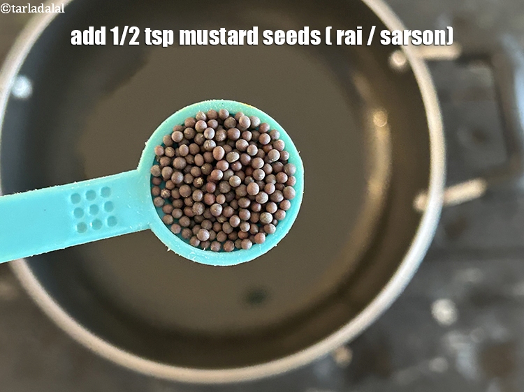 Step 10 – Add&nbsp;<meta charset="UTF-8" />1/2 tsp&nbsp;<a href="glossary-mustard-seeds-sarson-rai-sarson-ke-beej-525i">mustard seeds ( rai / sarson)</a>.