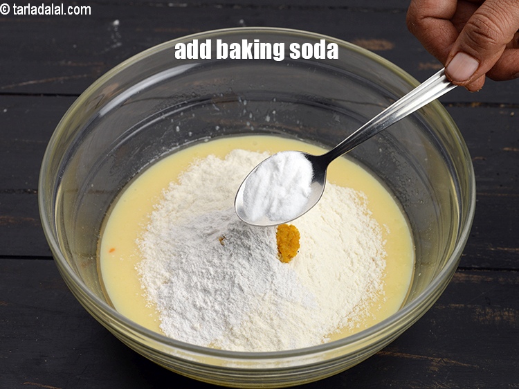 Step 11 – Add &frac12; tsp&nbsp;<a href="https://www.tarladalal.com/glossary-baking-soda-soda-bi-carb-615i">baking soda</a>.