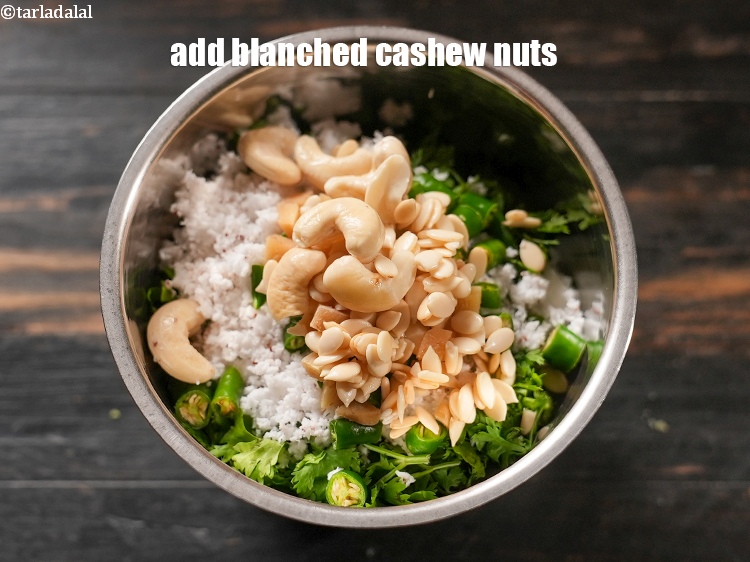 Step 11 – Add &frac12; tbsp blanched <a href="https://www.tarladalal.com/glossary-cashew-nuts-kaju-840i">cashew nuts (kaju)</a>.