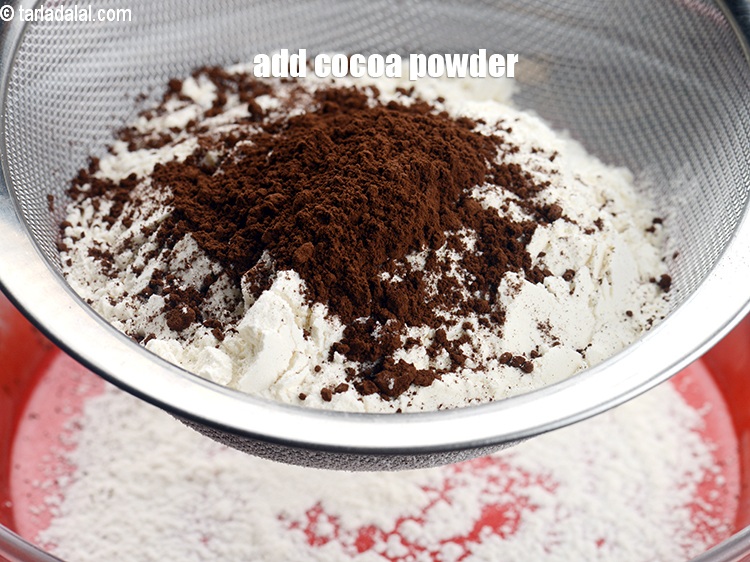 Step 14 – Add 2 tsp <a href="https://www.tarladalal.com/glossary-cocoa-powder-284i">cocoa powder</a>.
