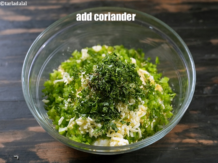 Step 10 – Add 1 tbsp finely <a href="https://www.tarladalal.com/glossary-chopped-coriander-783i">chopped coriander (dhania)</a>.
