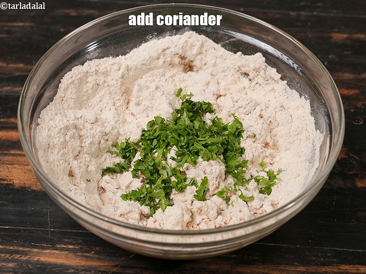 Step 10 – Add 2 tbsp finely <a href="https://www.tarladalal.com/glossary-chopped-coriander-783i">chopped coriander (dhania)</a>.