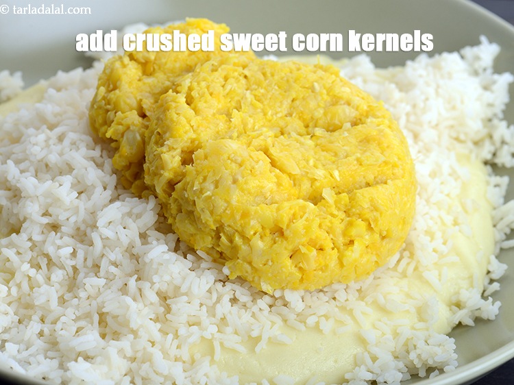 Step 10 – Add 1 1/2 cups <a href="https://www.tarladalal.com/glossary-crushed-sweet-corn-kernels-1605i">cooked and coarsely crushed</a>&nbsp;<a href="https://www.tarladalal.com/glossary-crushed-sweet-corn-kernels-1605i">sweet corn kernels</a>.