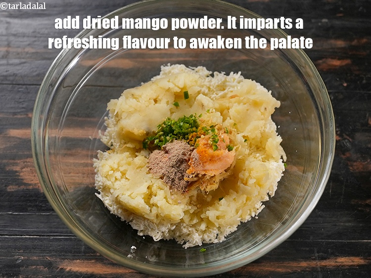 Step 11 – Add 1/4 tsp <a href="https://www.tarladalal.com/glossary-dried-mango-powder-amchur-powder-148i">dried mango powder (amchur)</a>. It imparts a refreshing flavour to awaken …