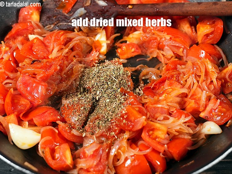 Step 10 – Add 1 tsp&nbsp;<a href="https://www.tarladalal.com/glossary-dried-mixed-herbs-466i">dried mixed herbs</a>.&nbsp;