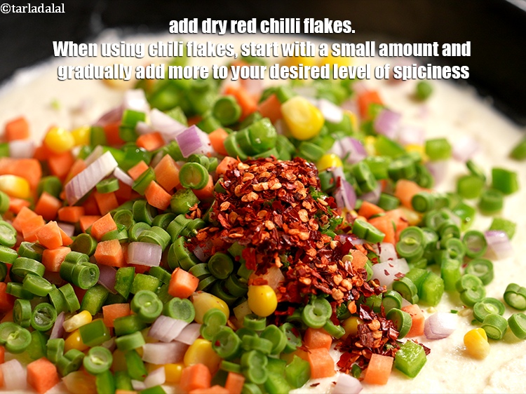 Step 10 – Add &frac12; tsp <a href="https://www.tarladalal.com/glossary-dry-red-chilli-flakes-paprika-338i">dry red chilli flakes (paprika)</a>. When using chili flakes, start with …
