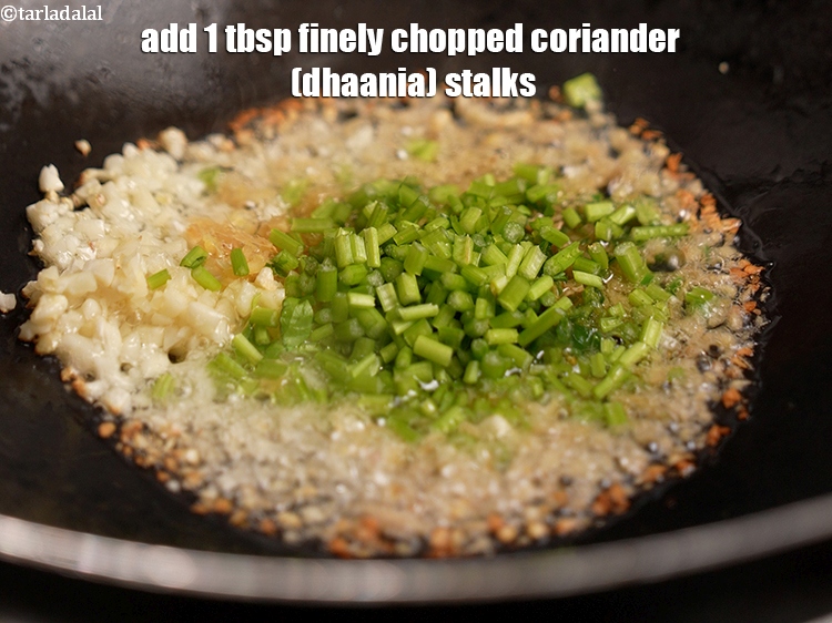 Step 10 – Add 1 tbsp&nbsp;finely&nbsp;<a href="https://www.tarladalal.com/glossary-chopped-coriander-stalks-2331i">chopped coriander (dhaania) stalks</a>.