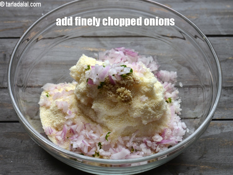 Step 10 – Add &frac14; cup finely <a href="https://www.tarladalal.com/glossary-chopped-onions-722i">chopped onions</a>.
