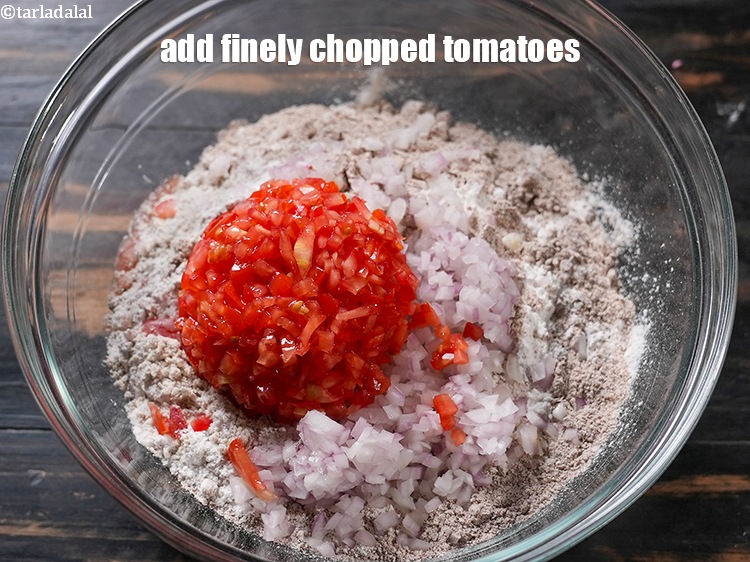 Step 10 – Add 1/2 cup finely <a href="https://www.tarladalal.com/glossary-chopped-tomatoes-779i">chopped tomatoes</a>.
