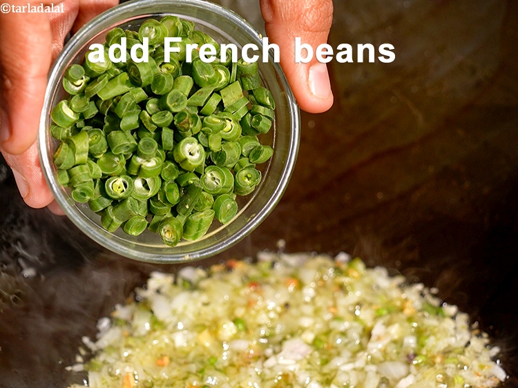 Step 13 – Add &frac14; cup finely&nbsp;<a href="https://www.tarladalal.com/glossary-chopped-french-beans-797i">chopped french beans</a>.&nbsp;French beans add a bit of crunch and texture …
